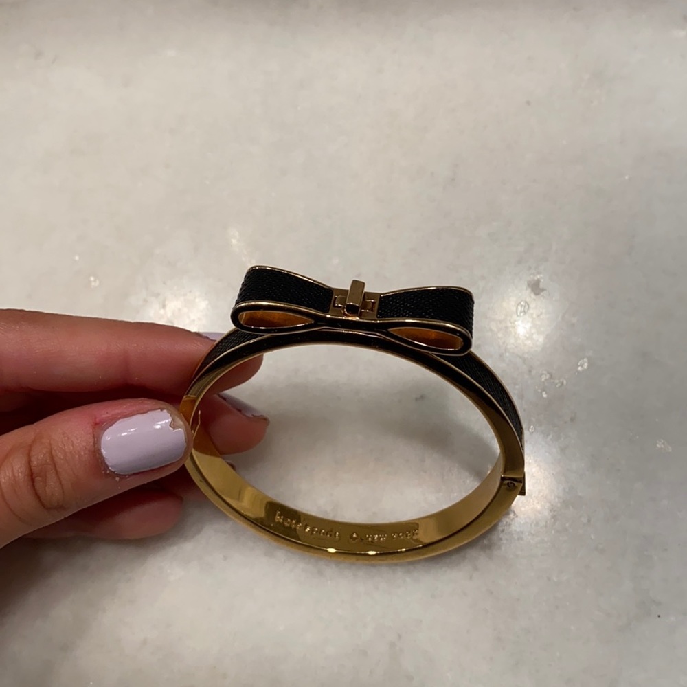 Kate Spade Gold and black bow bracelet